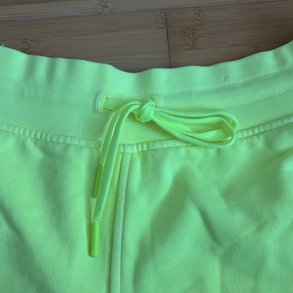 Lululemon inner Glow High rise neon yellow sweat pant shorts - Picture 3 of 10